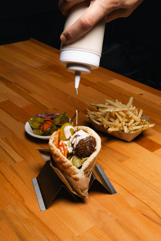 Falafel pita with tahini drizzle at Mazal, Charleston SC