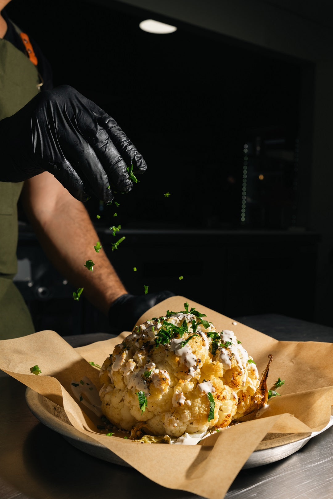 Vegan Mediterranean food in Charleston SC — whole roasted cauliflower with tahini at Mazal